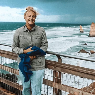 A Khaki and Ocean founder on a coastal lookout